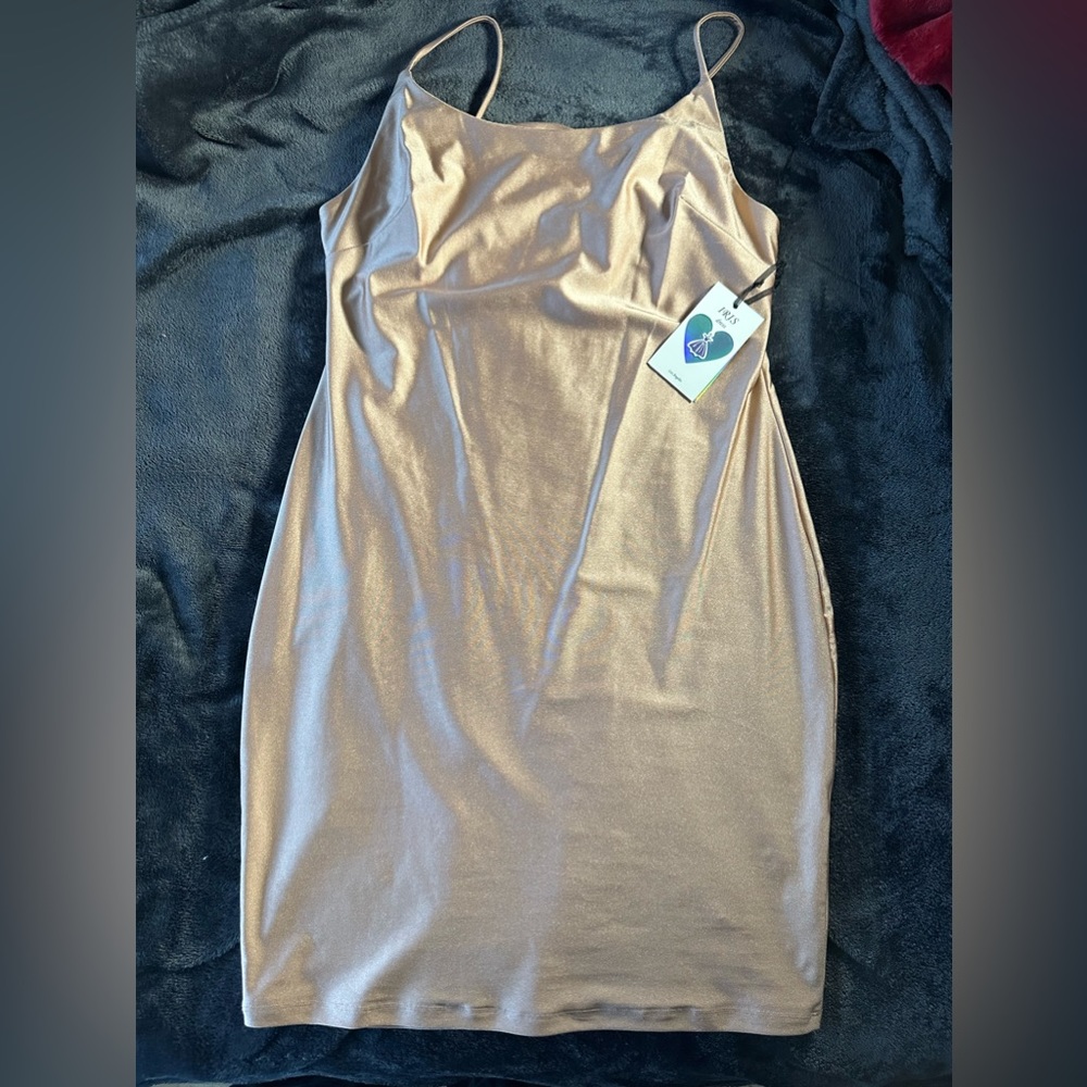 Iris; tan/nude silky dress